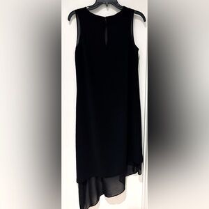 White House Black Market Beautiful, Unique Dress. Sleeveless w/sheer accents